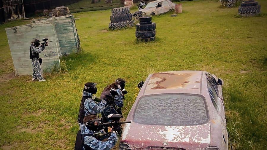 Team in action next to the wrecked car, Area 51 field
